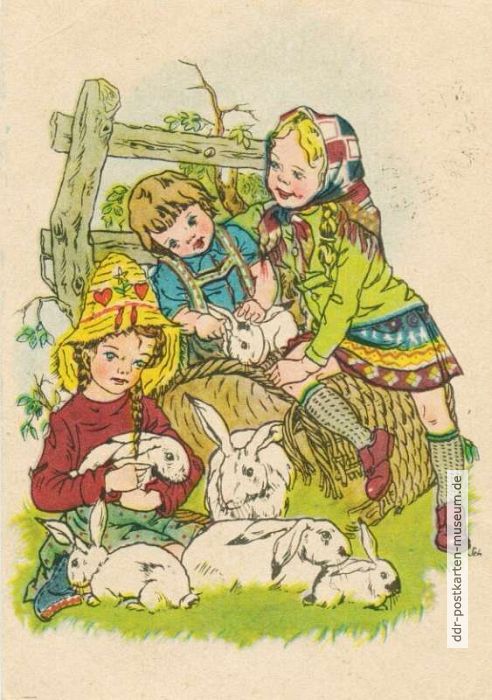 Kinder im Zeitvertreib mit Kaninchen - 1950